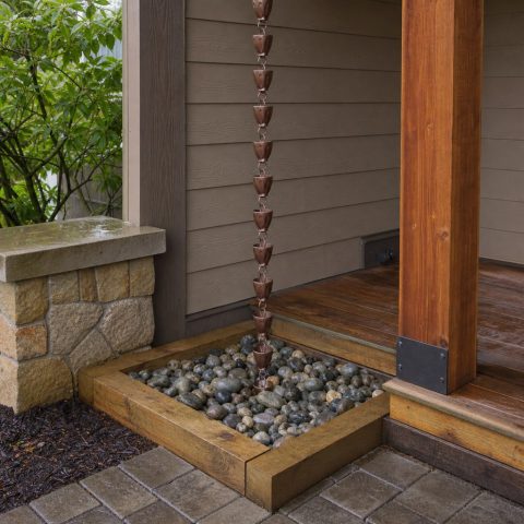 Rain Chain Catch Basin With Stone and Timber Edging