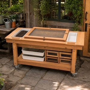 Garden Netting Repair Table With a Captured Work Frame