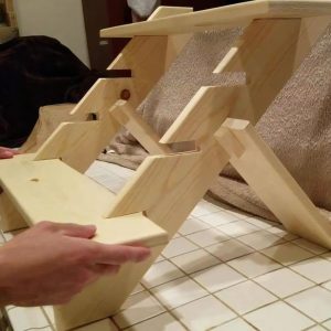 A Folding Wooden Stool That Locks Securely