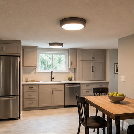 Low-ceiling kitchen with simple round flush-mount fixtures