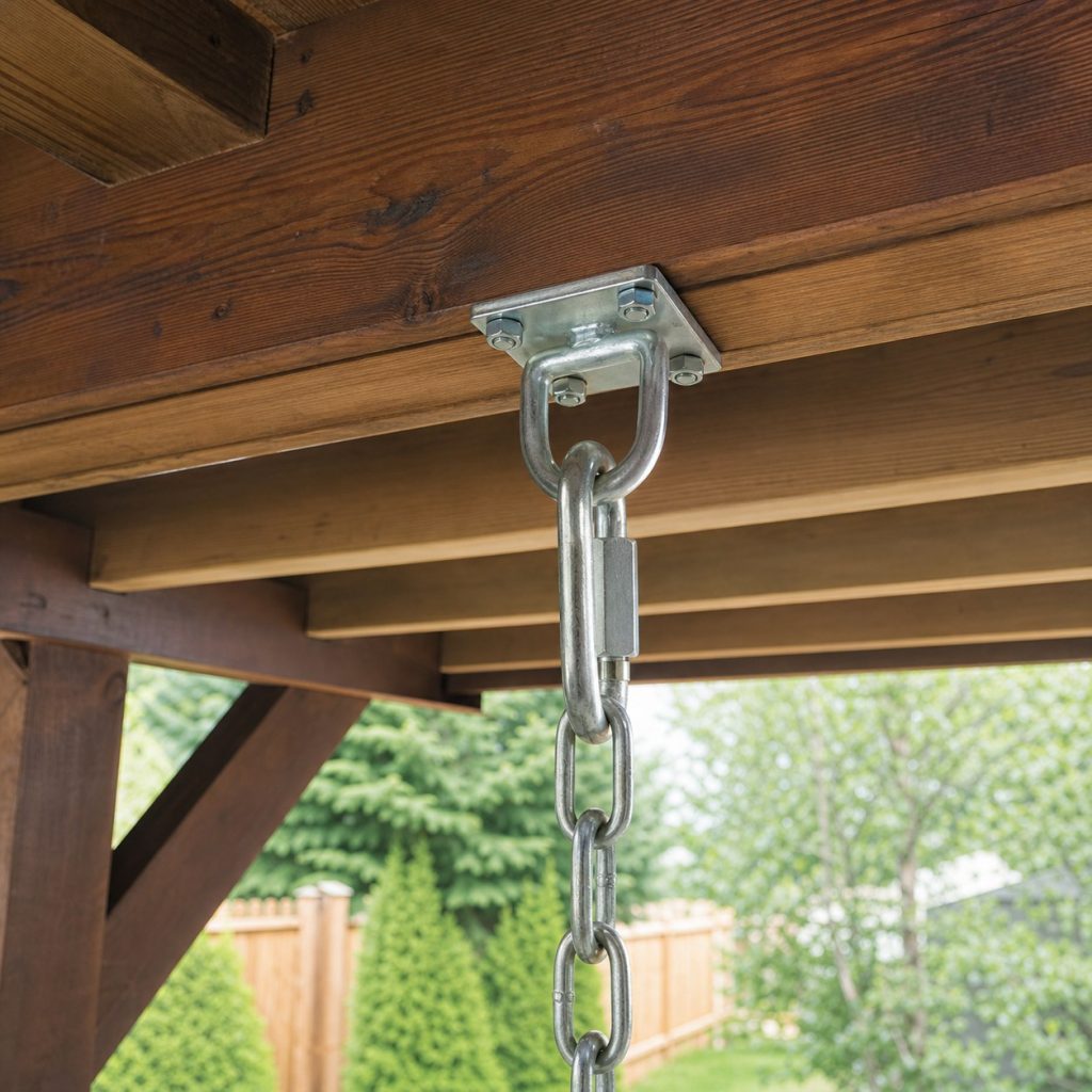 Close view of porch swing rated hanger chain connector and structural ceiling beam