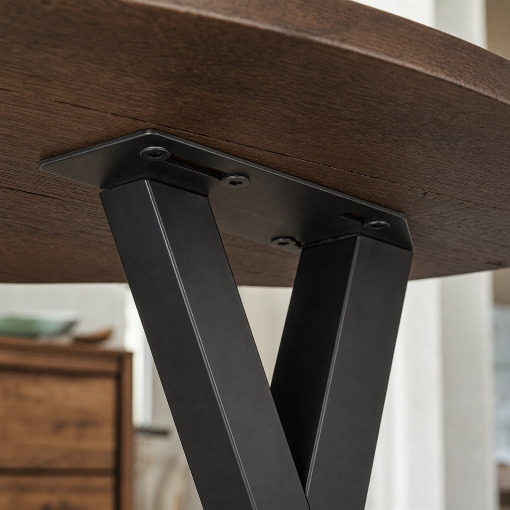 Smoked Oak Dining Table With Double-V Steel Legs - wood-to-steel interface detail