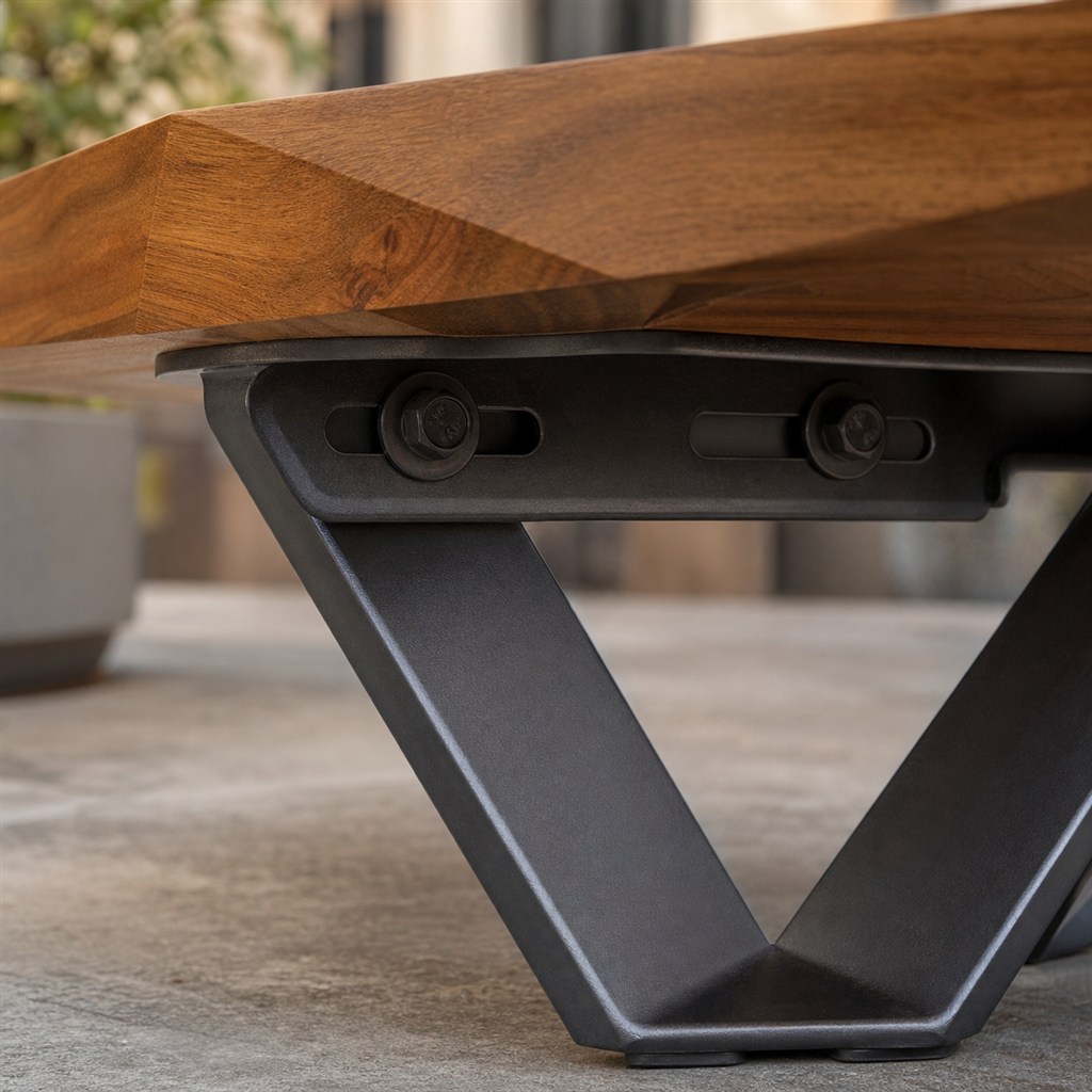 Sculptural End Table With a Faceted Wood Top and Steel V-Base - wood-to-steel interface detail